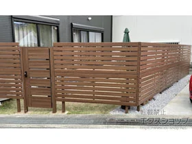 LIXIL(リクシル)のフェンス・柵 フェンスAA YS3型 横スリット 板張り 木調カラー アルミ多段柱仕様 施工例