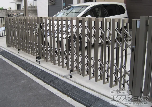 東京都広島市のYKKAPのカーゲート アルシャインII HW型Aタイプ ノンレール 両開き630W 施工例