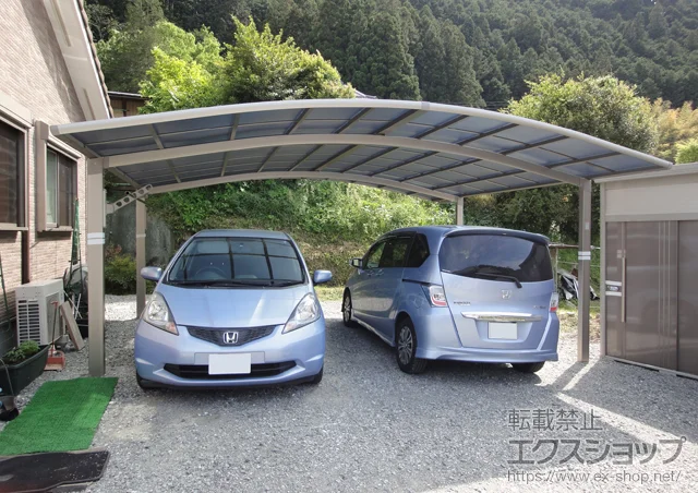 奈良県周南市のYKKAPのカーポート カーブポートシグマIII ワイド　積雪〜20cm対応+収納式物干し標準タイプ 2本入 施工例