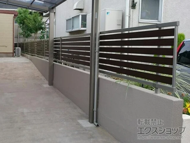 福岡県横須賀市のLIXIL(リクシル)のフェンス・柵 ルシアスフェンスF04型 横板 木目カラー 自由柱施工 施工例