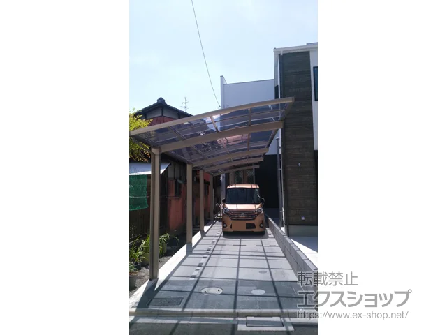 大阪府川崎市のYKKAPのカーポート ネスカR (ラウンドスタイル) 縦連棟 積雪〜20cm対応 施工例