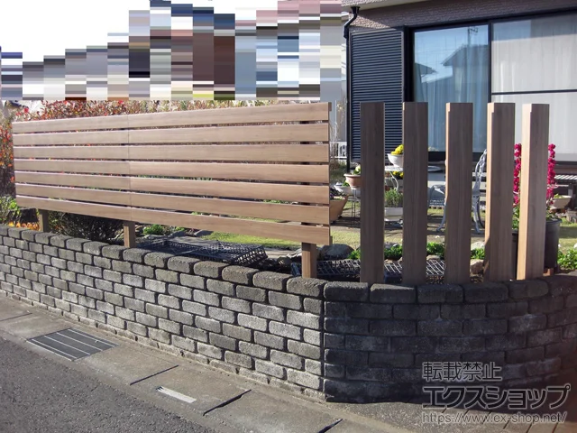埼玉県流山市のLIXIL(リクシル)のフェンス・柵 フェンスAA YS3型 横スリット 板張り 木調カラー アルミ多段柱使用（パネル1段） 施工例