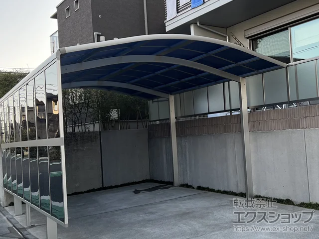 千葉県枚方市のYKKAPのカーポート レイナツインポートグラン　積雪〜20cm対応+サイドパネル*2段（外観左側設置） 施工例